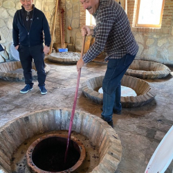 Eldar-Mildiani-and-winemaker-consultant-Gorgi-Dakishvikli-stirring-the-leese-